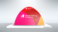 Dome-Pavillon 3x3 der Bürgerstiftung Hamburg mit mehrfarbiger Gesamtgestaltung und dem Logo auf dem kompletten Pavillon